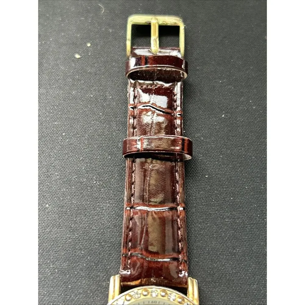 Gold Tone Pearlized Dial Women’s Quartz Watch